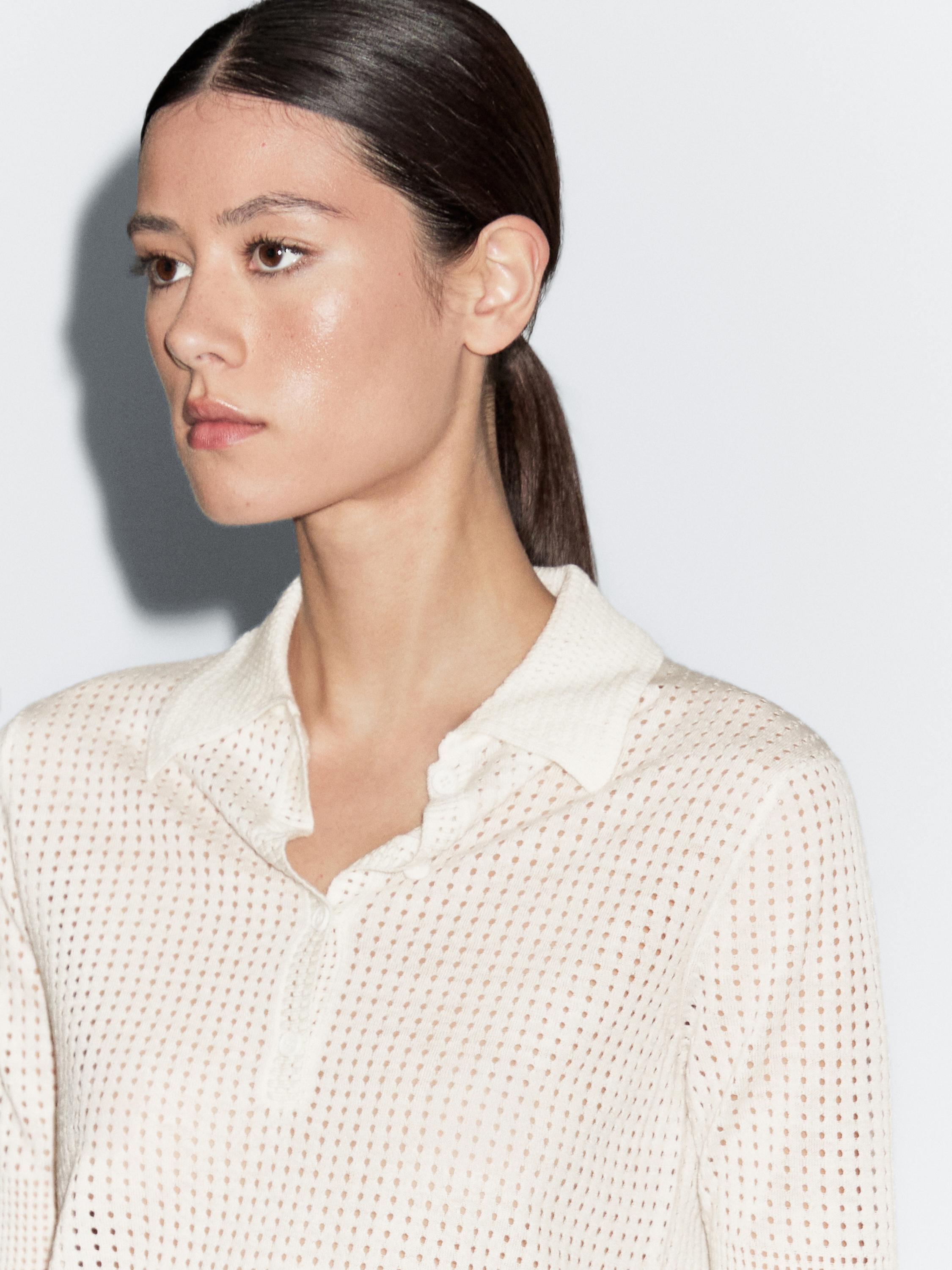 Open knit sweater with polo collar